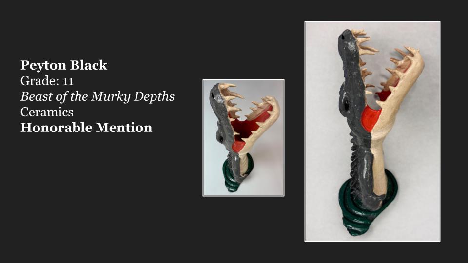 Ceramic sculpture titled 'Beast of the Murky Depths' by artist Peyton Black, featuring a stylized creature's head with opened jaws, showcasing contrasting colors and textures.