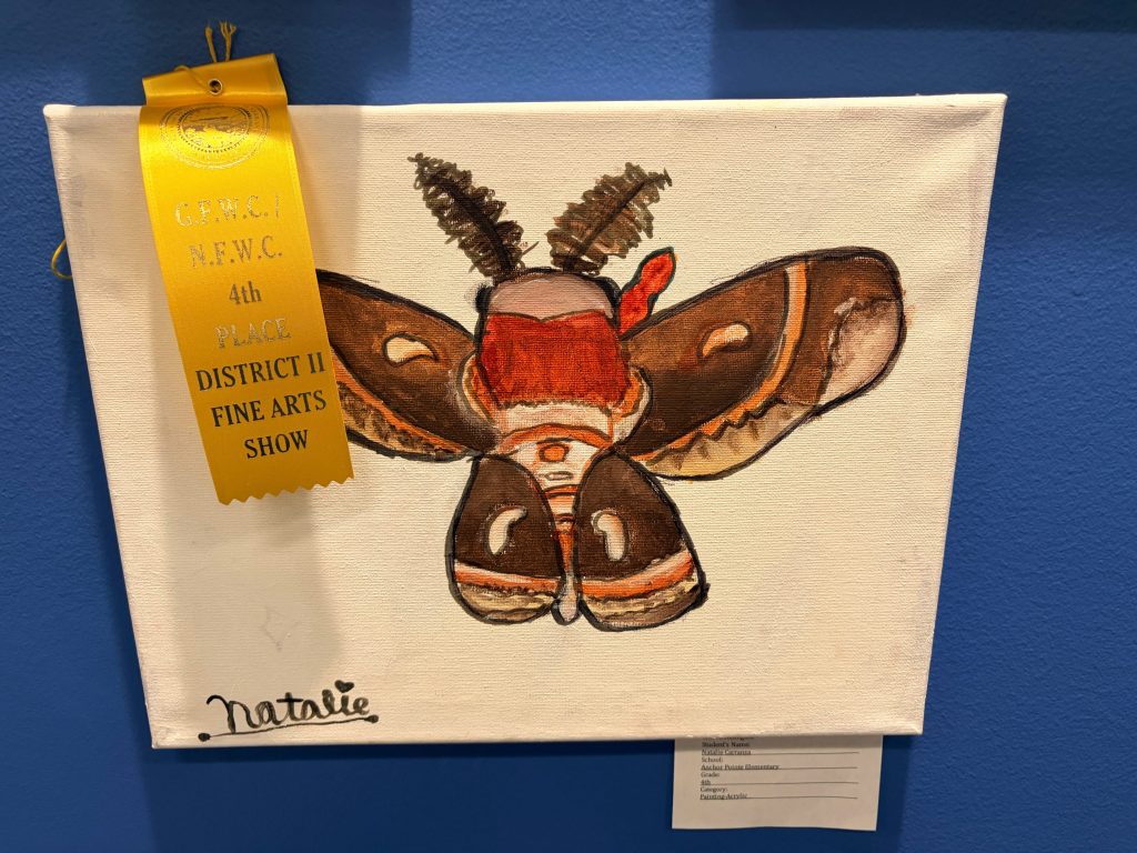 A painting of a moth featured in a fine arts show, with a yellow ribbon indicating 4th place, and the artist's name 'Natalie' signed at the bottom.